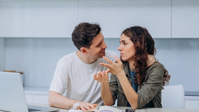 couple having a conversation at a table