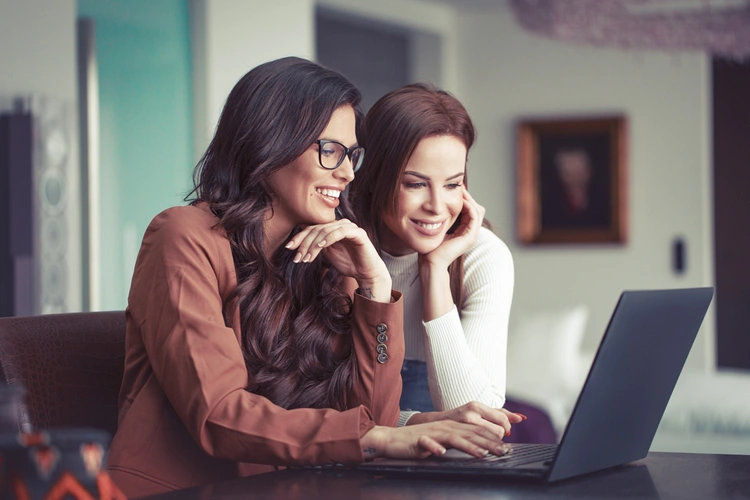 two women on laptop