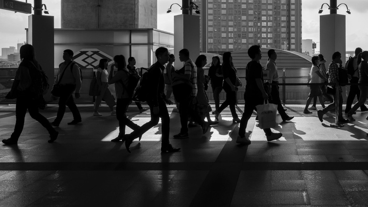 People walking busy city Qatalog