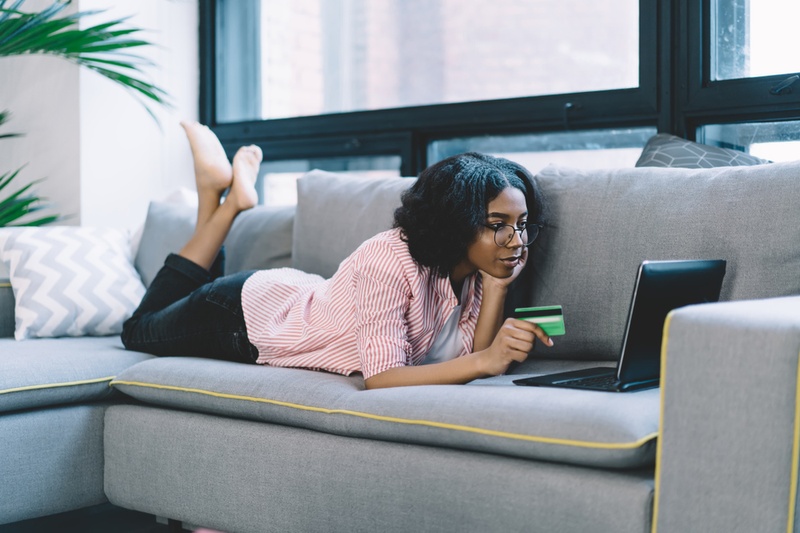woman paying for something online with credit card