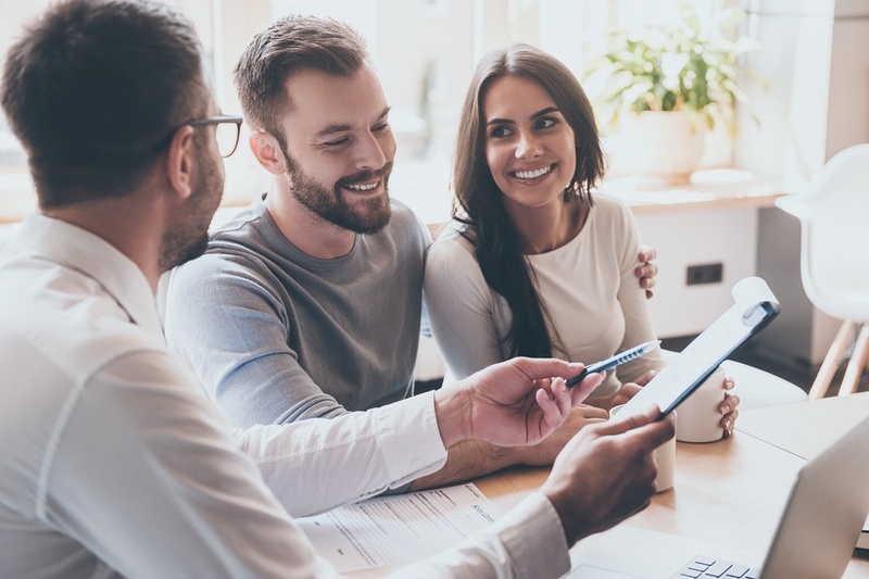 couple speaking to a mortgage adviser
