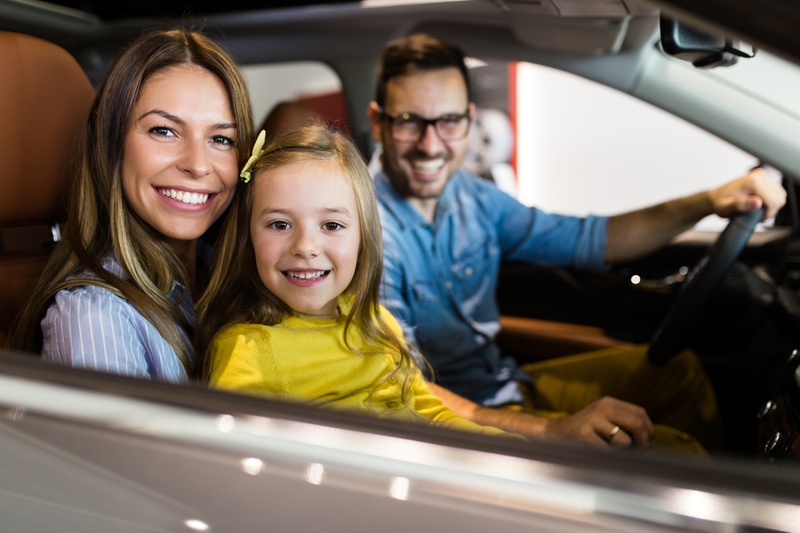family in new car