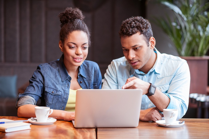 Couple looking at laptop