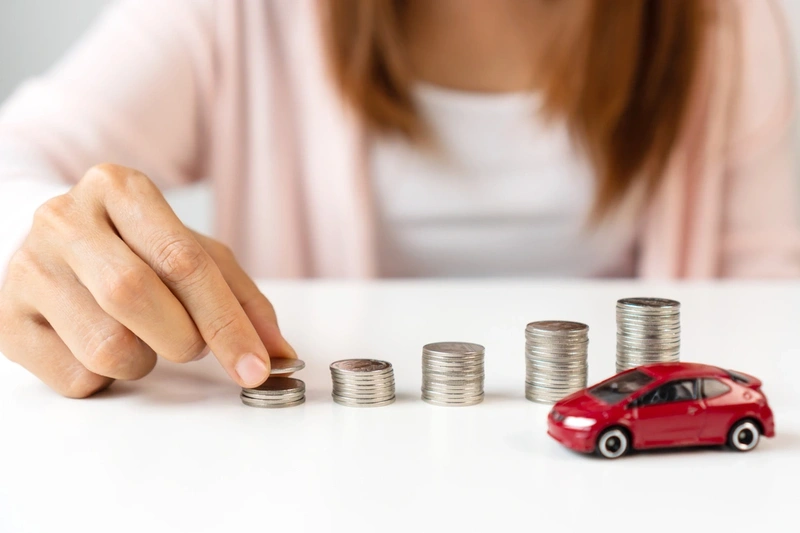 Toy car with stacks of coins