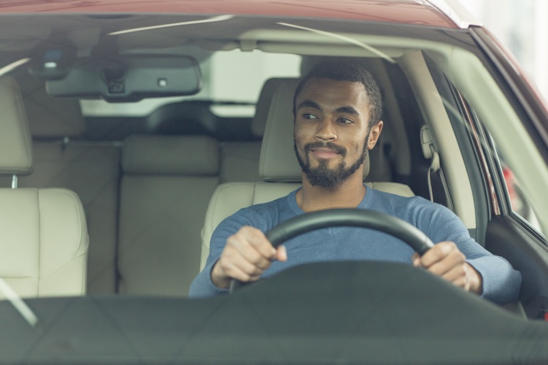 Man driving his car.