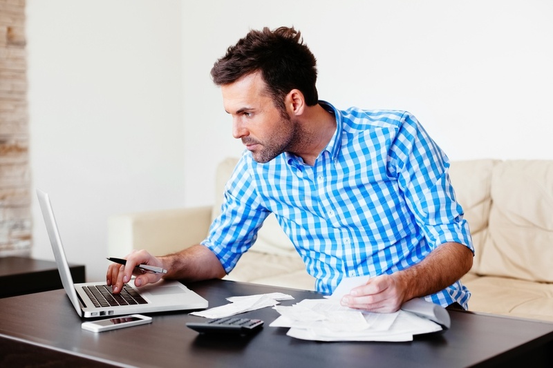 man checking finances