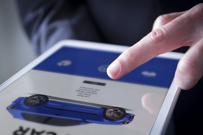 looking at cars on an ipad