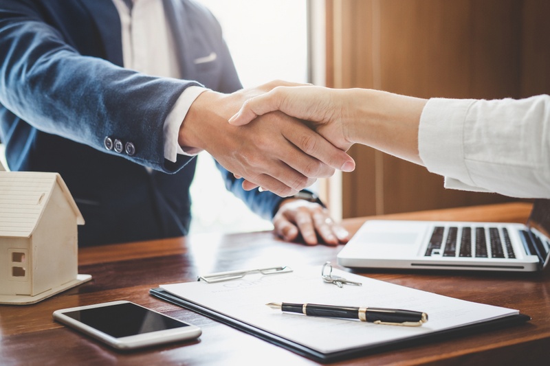 two businesspeople shaking hands