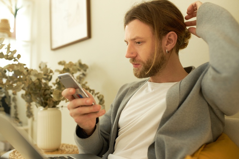 man researching on internet