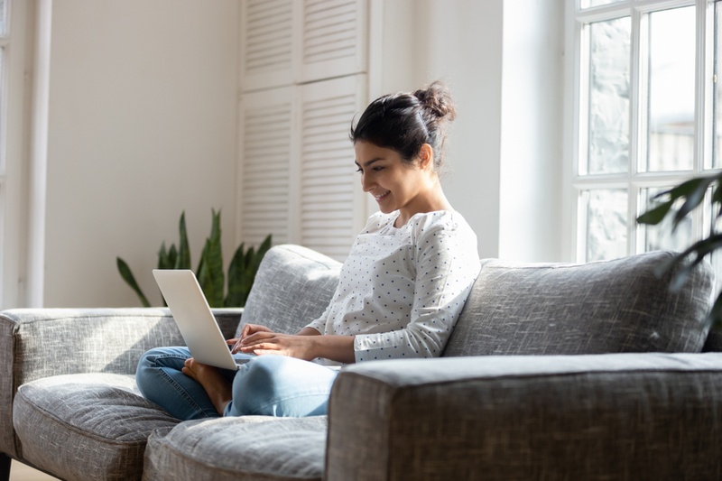 happy lady on laptop