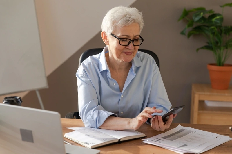 Woman using a calculator