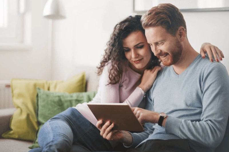 Couple reading on a sofa
