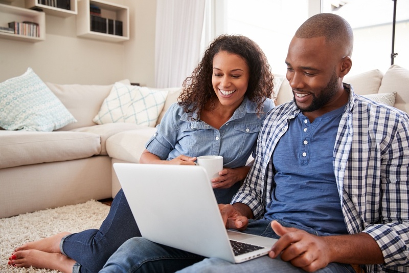 couple on laptop at home