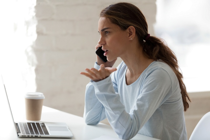 stressed woman on phone