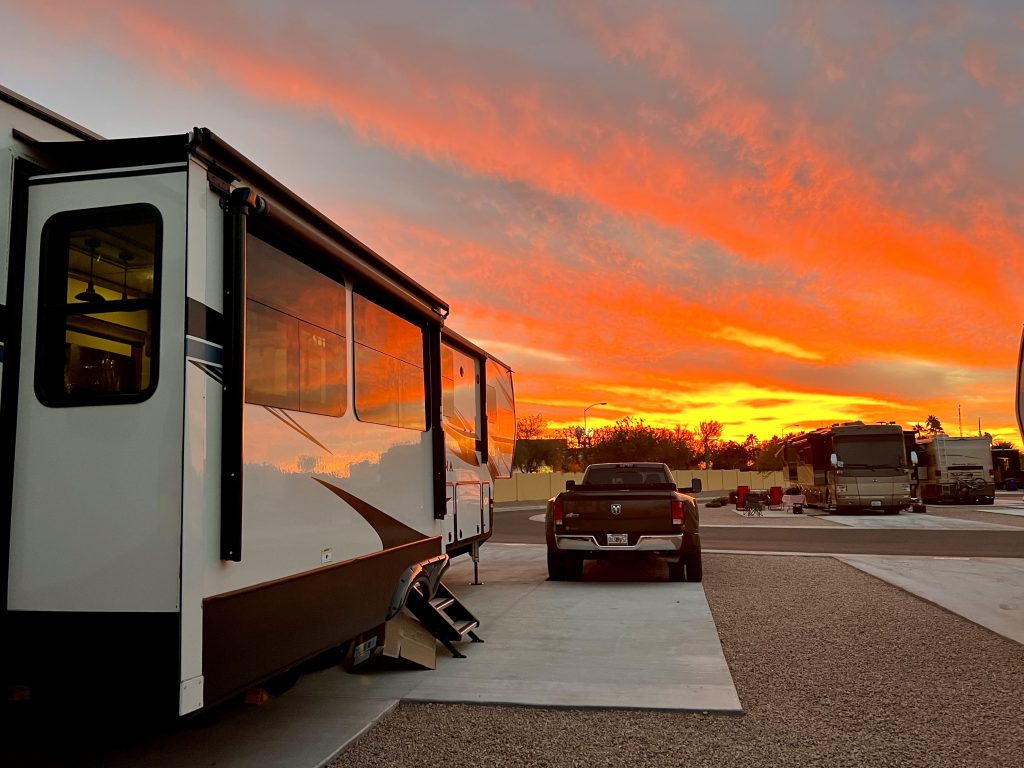 RV at campground with amazing sunset