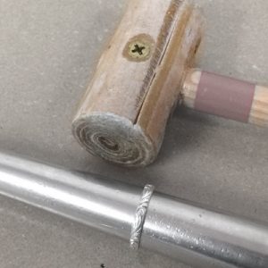 Shaping a finger ring on a ring mandrel with rawhide hammer