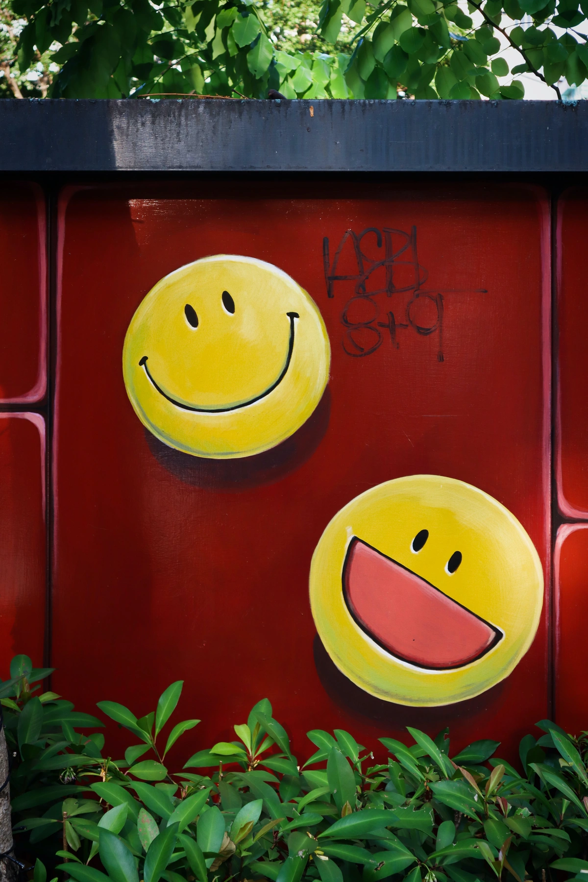 Graffiti of two smiley faces on a wall indicates a satisfied customer. This new article tells you what to look for in a CRM.