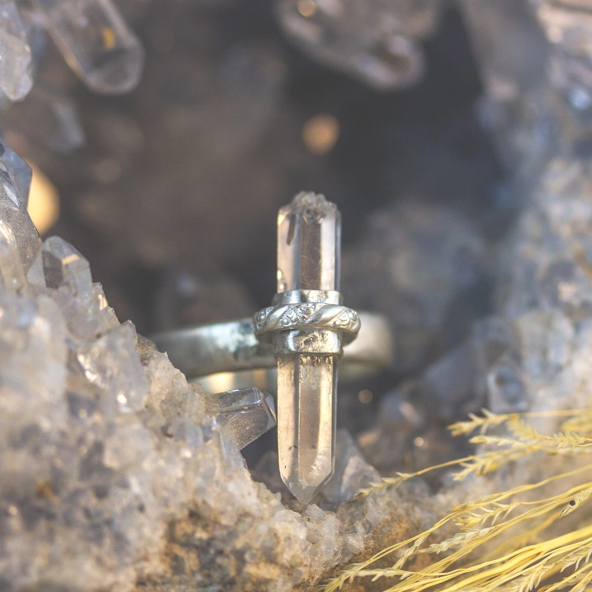 raw crystal ring with a band around the center of the crystal