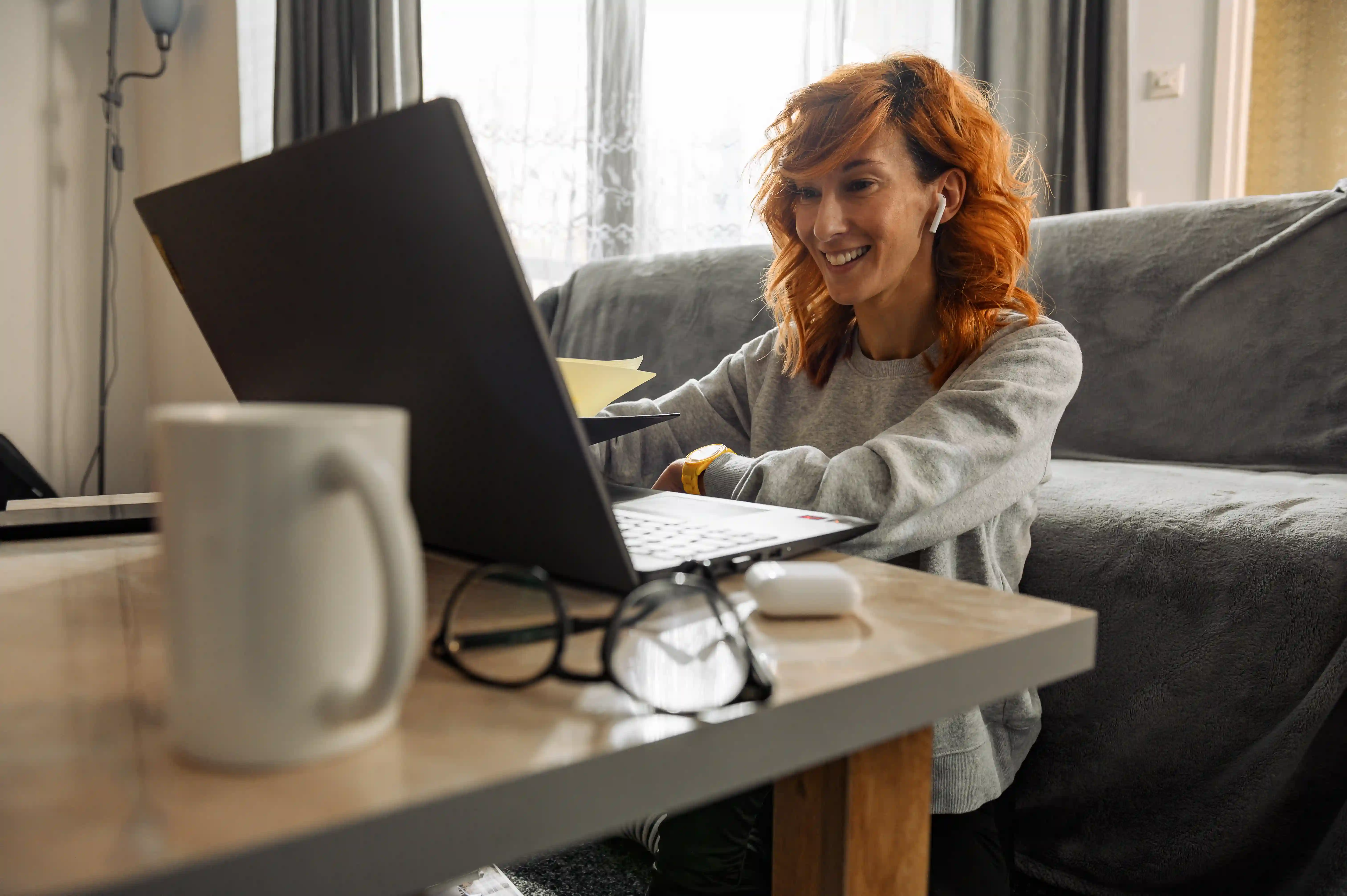 Remote professional working on laptop representing distributed workforce productivity