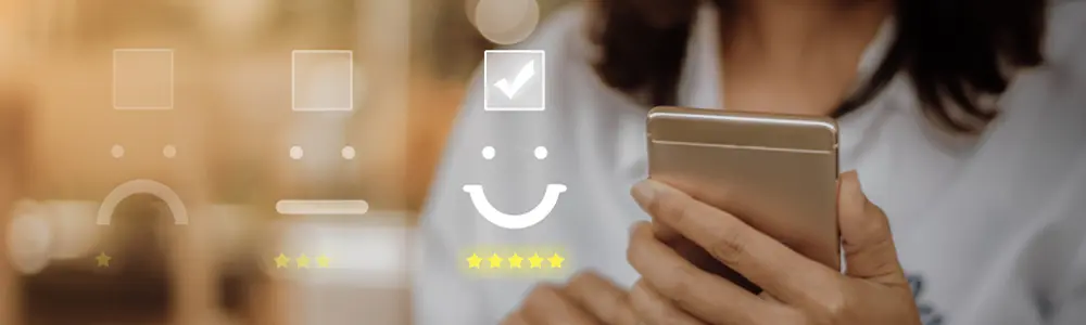 person sending smile emoji on phone