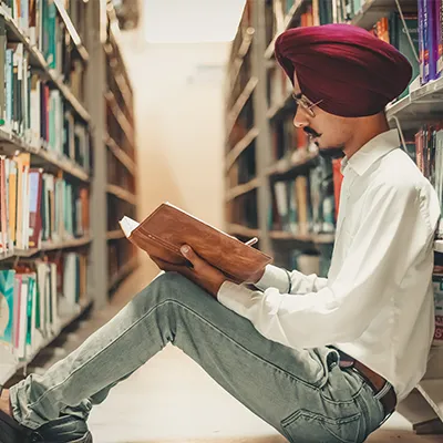 Arab man reading.