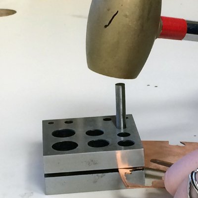 Cutting out metal circles
