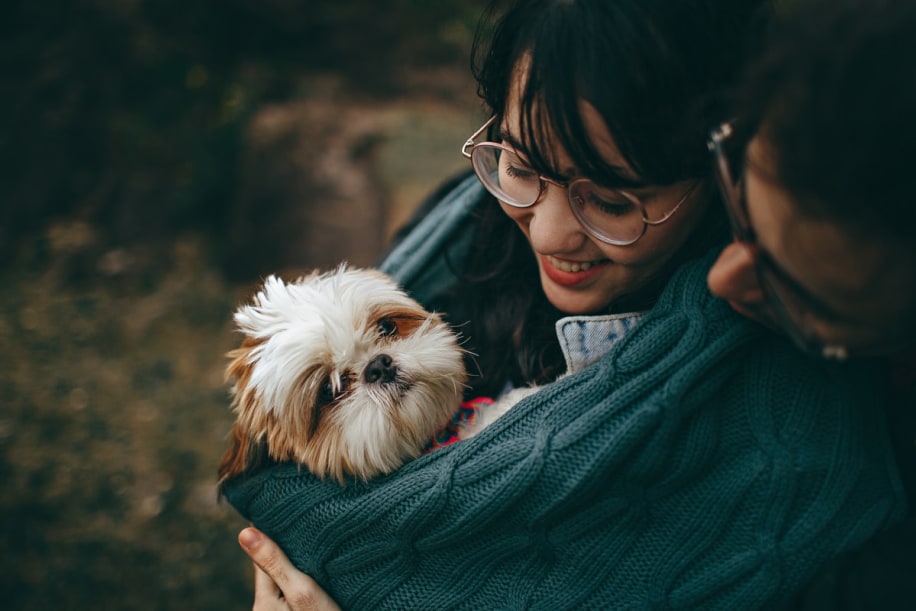 Happy family with puppy