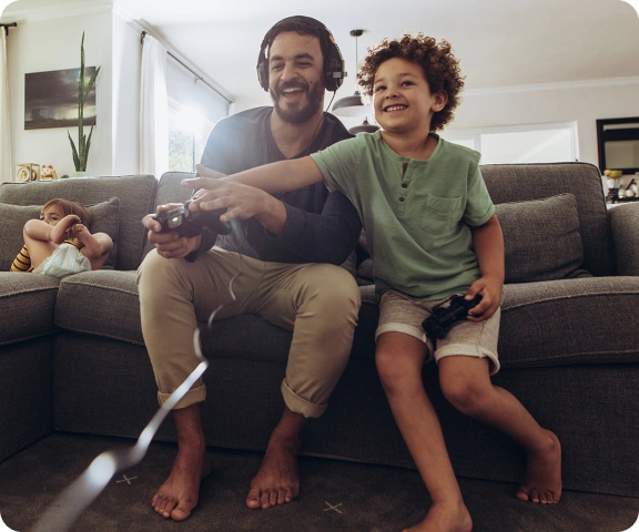 dad and son playing xbox