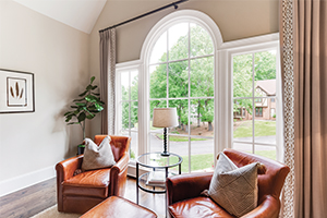 Interior living room with Infinity half moon fiberglass window