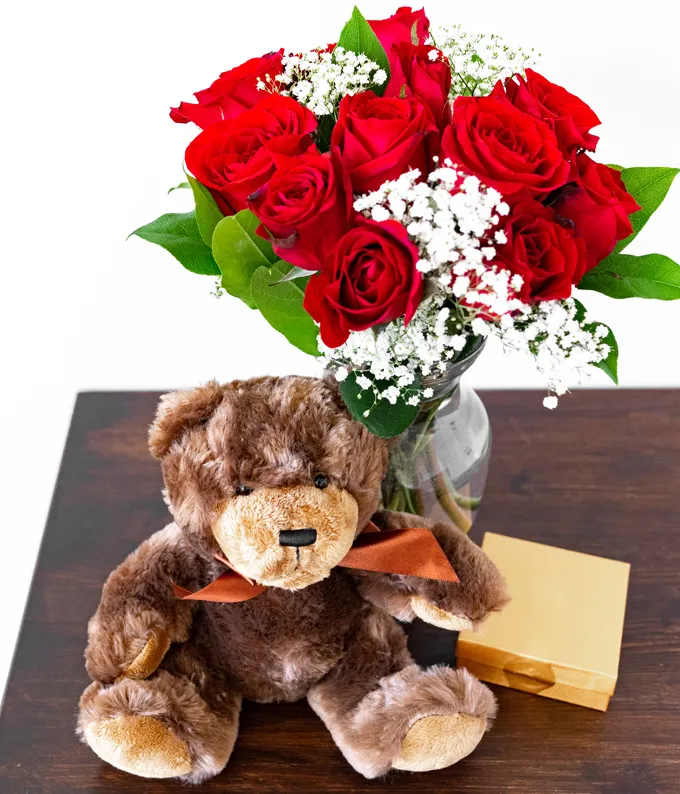 Roses with chocolates and bear