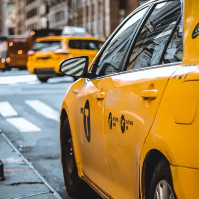 Taxi on a city street.