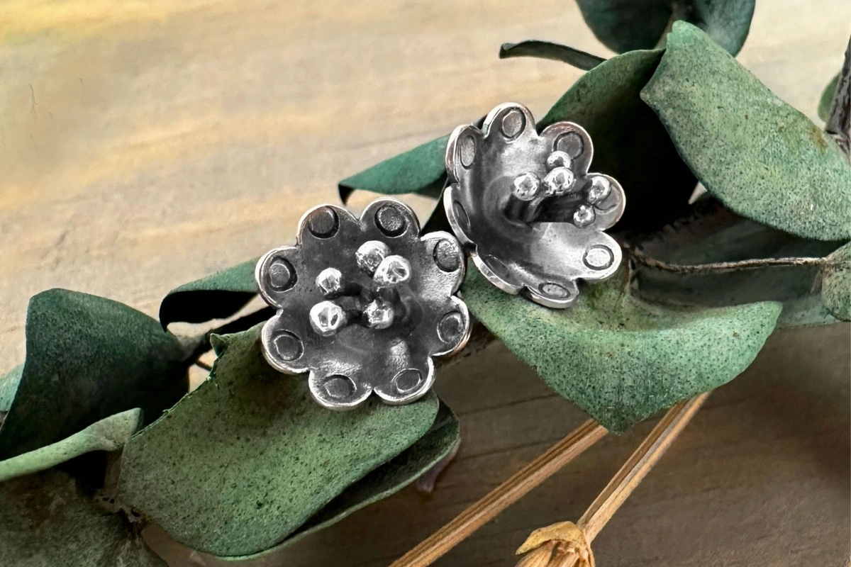 Adding balled wire to flower blanks - flower earrings with balled wire in the center