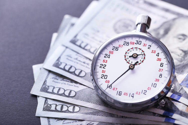clock and money for early loan repayment