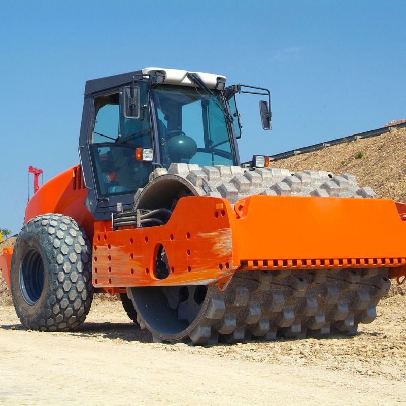 Soil compactor with padfoot attachments