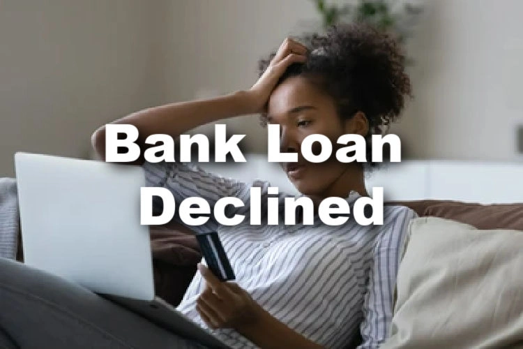 woman trying to pay payday loan online with text Bank loan declined