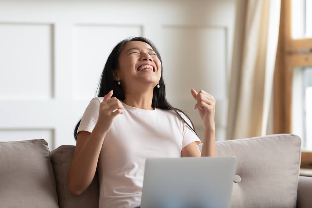 woman happy from online title loan help