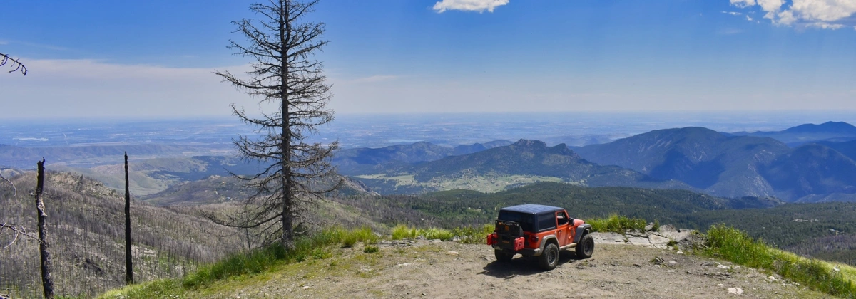 Jeep on top of Storm Mountain offroad trail near Loveland