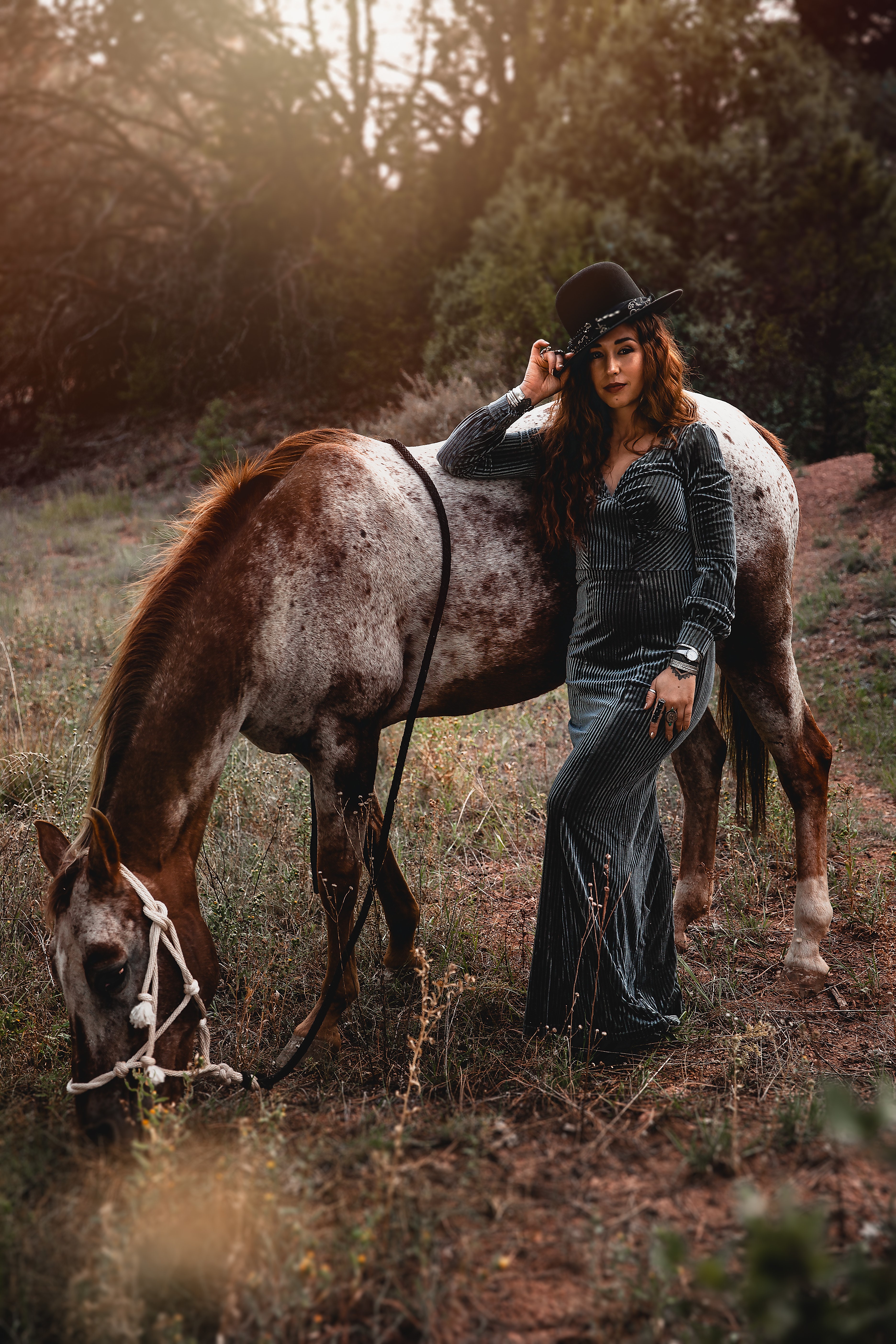 Leah Prada Harrison with a horse in a field