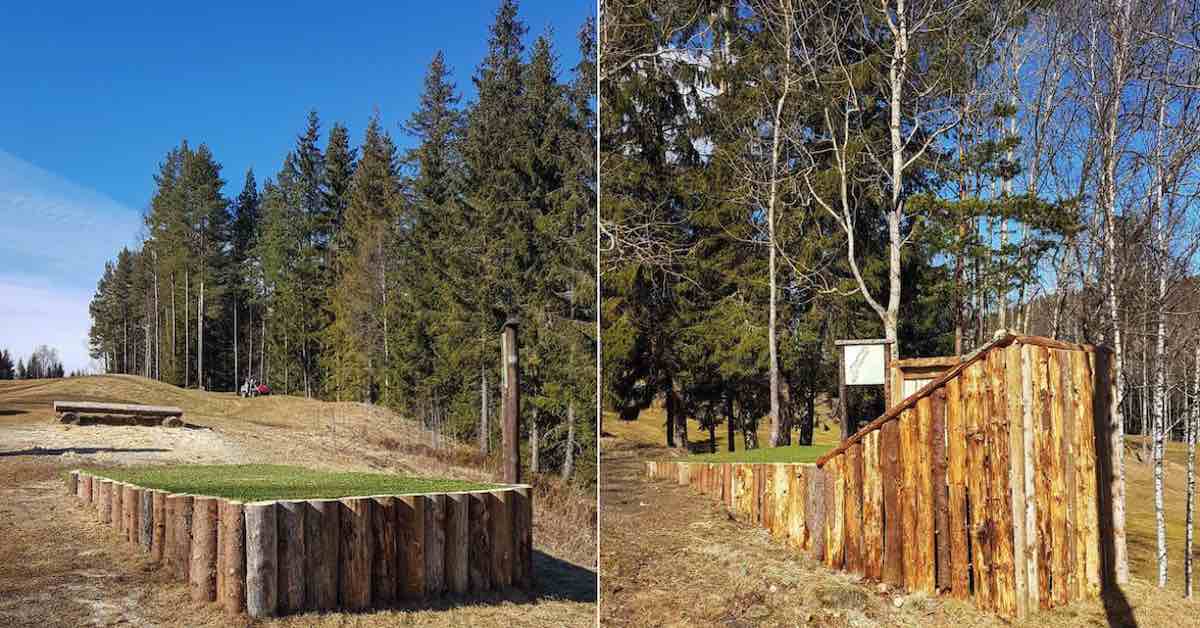 Two disc golf tee pads framed by natural wood logs