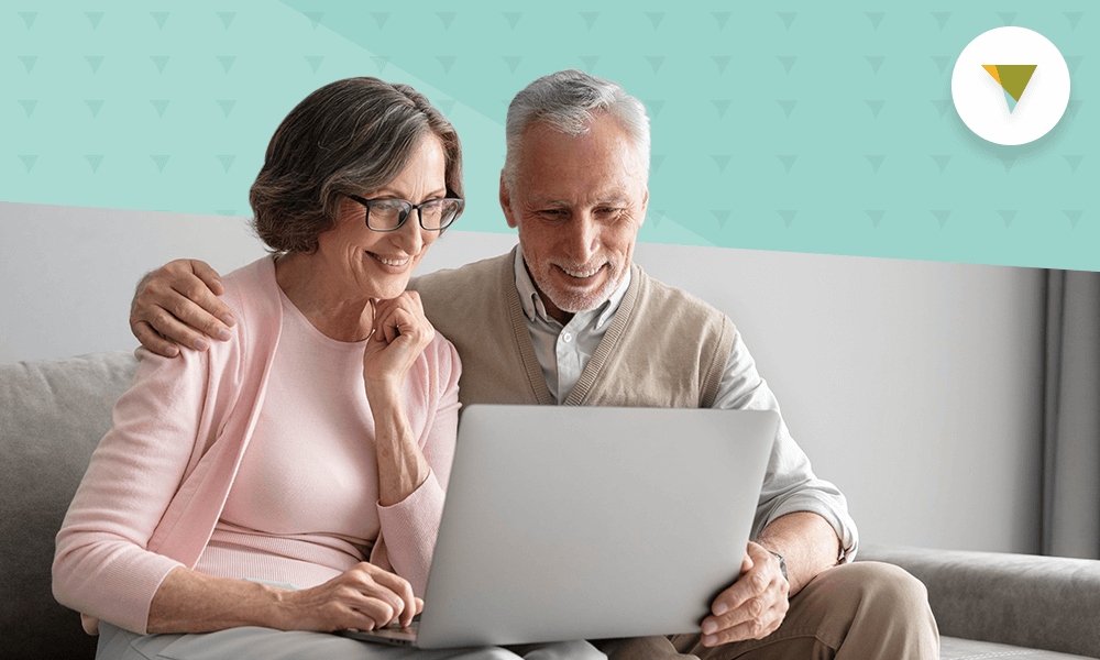 Elderly couple on computer