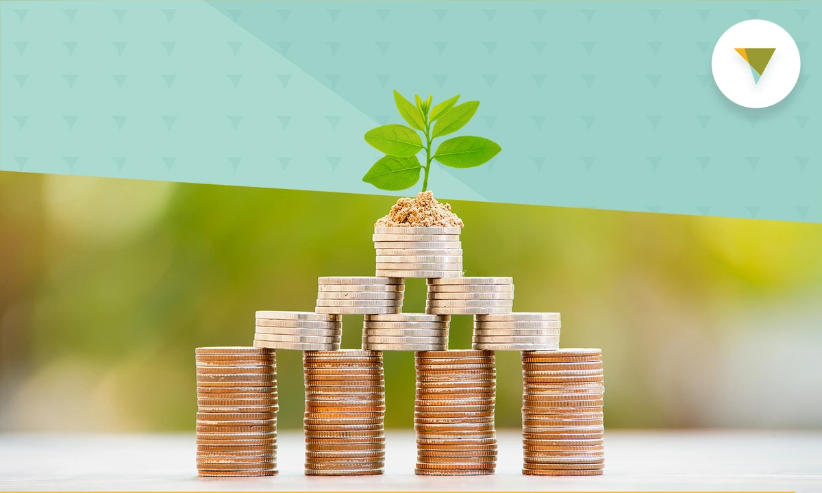 Small plant growing from coins.
