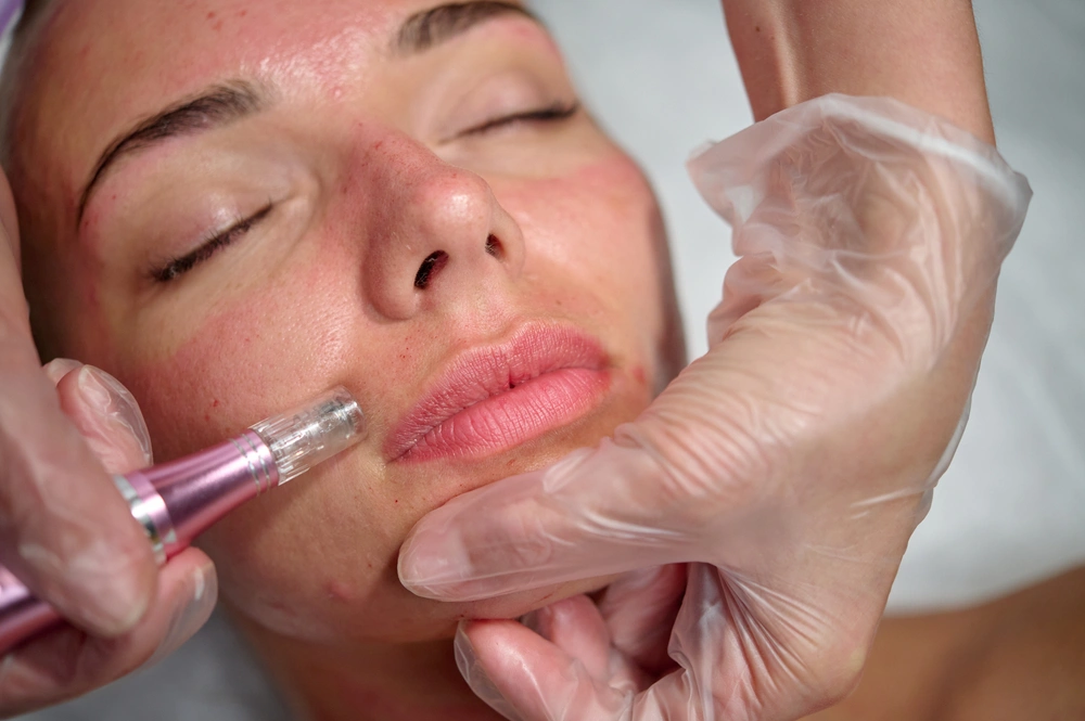 A woman undergoing an in-office facial treatment