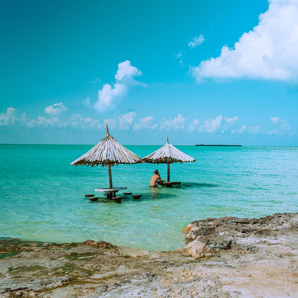 Man at Secret Beach Belize.webp