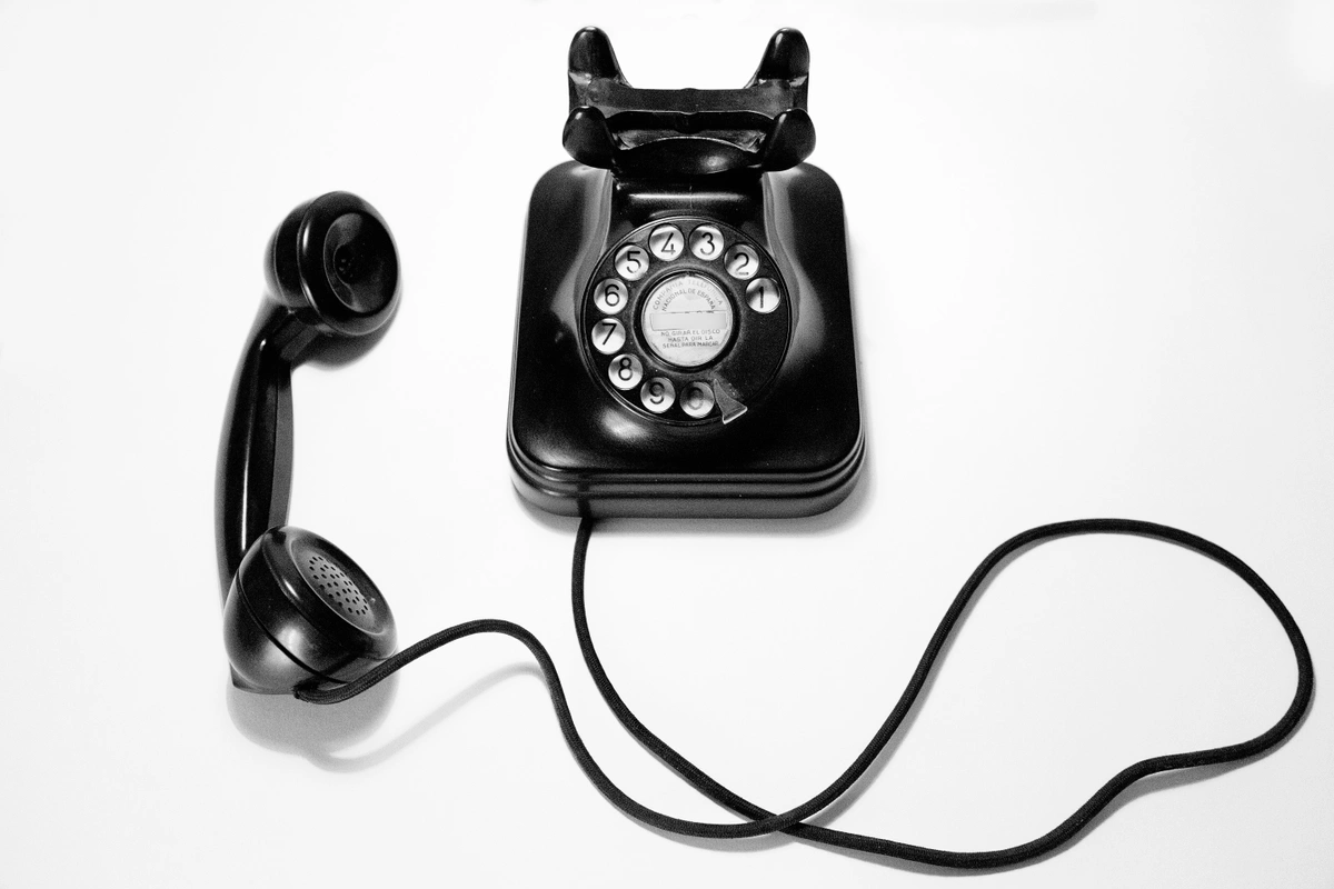 A black phone on a white background. FiveCRM tells you how telemarketers can learn to have more powerful sales conversations.