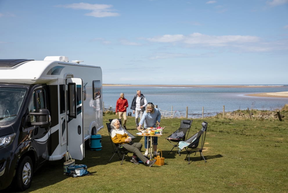 retired friends rving on beach