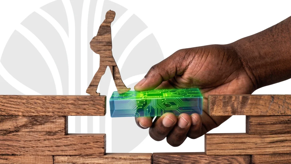 A hand holding a green and blue digital woodblock bridges a gap for a woodblock person to walk across.