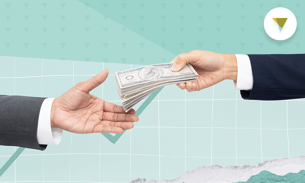 Man handing man money