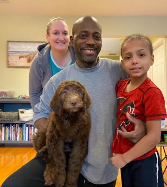 Family with puppy