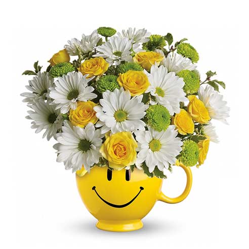 Mini yellow roses and white daisies smiley face cup bouquet