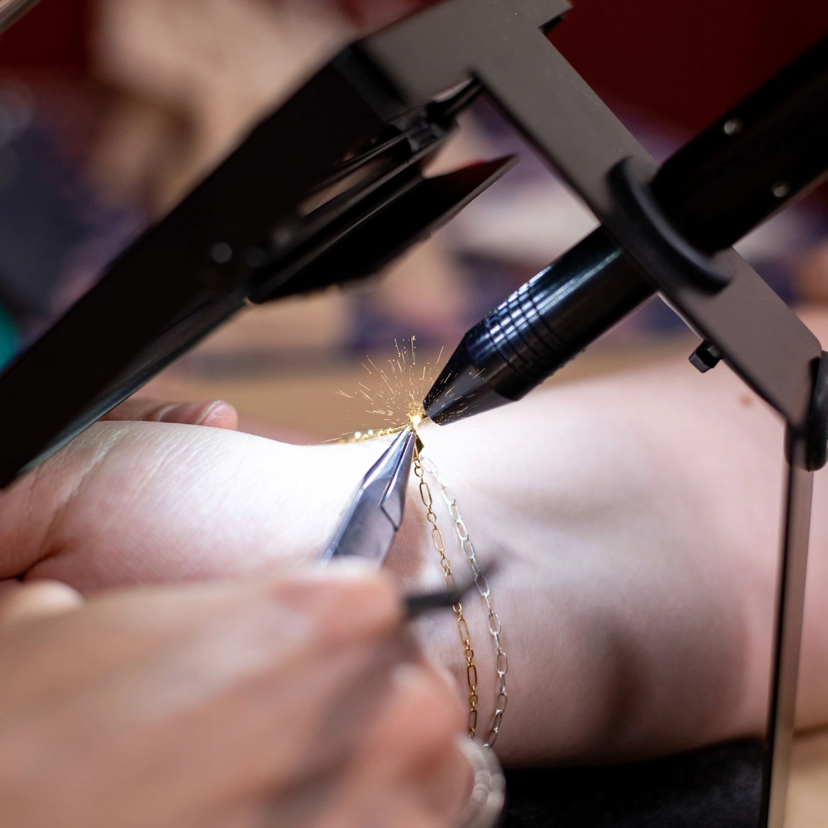 Pulse arc welder welding on a permanent bracelet